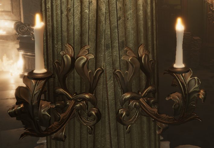 Twin wall sconces built from scrollwork cards